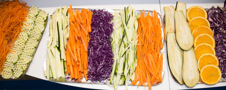 Closeup of fresh cut and whole vegetablesの写真素材