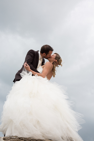 Happy and lovely wedding couple loving each otherの写真素材