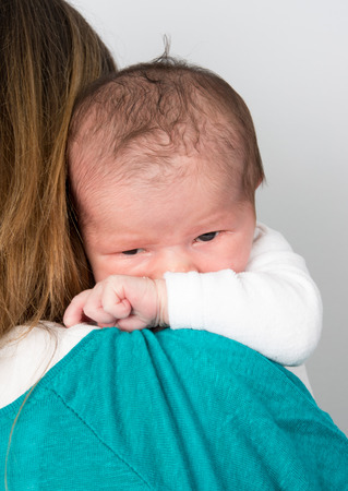 Portrait of angelic baby and her motherの写真素材