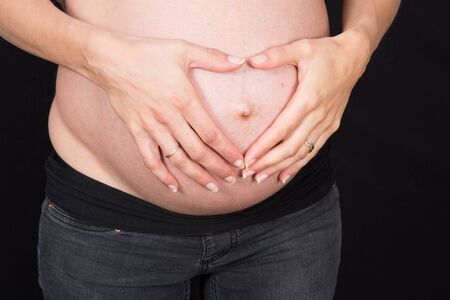 Belly of a pregnant womanの写真素材