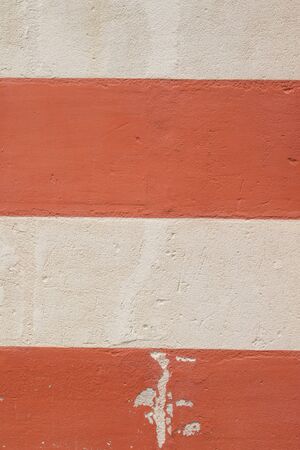 background of a wall with and red oldの写真素材