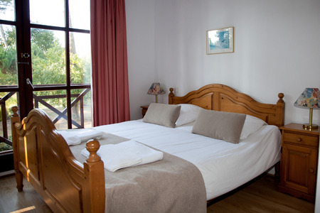 Double Bed In The Bedroomの写真素材