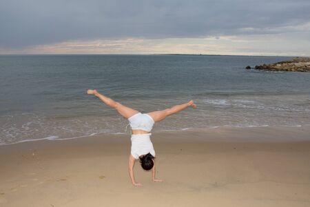 Beautiful girl having fun at beachの写真素材