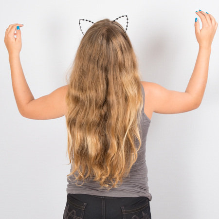 Young woman with healthy, long, blond hairの写真素材