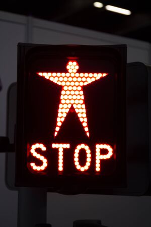 Red pedestrian lamp  means to stop, it's dangerousの写真素材
