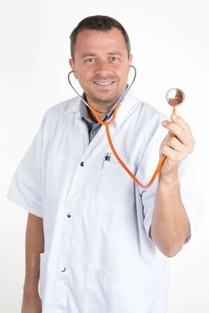 Male doctor  with stethoscope isolated on whiteの写真素材