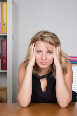 Beautiful woman blonde hair portrait close up studio on whiteの写真素材