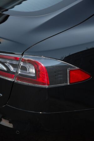 Back of a generic black sport carの写真素材