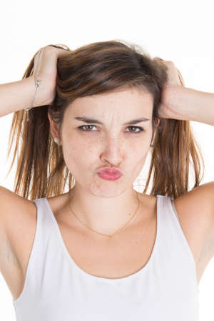 portrait of a young brunette, isolated on a white background