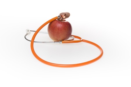 Apple and stethoscope on a white backgroundの写真素材