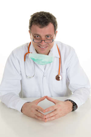 Portrait Of Happy Mature Male Doctor Isolated Over White Backgroundの写真素材
