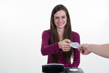 Business owner  on her fashion store's desk, feeling proud.の写真素材