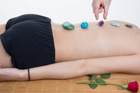 Alternative medicine, therapist using gemstones for the  lithotherapyの写真素材