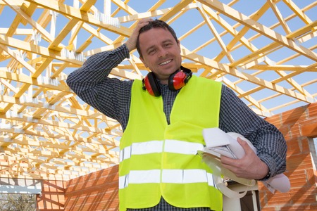 Adult construction manager or building site foreman worker