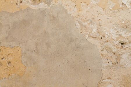 Surface of vintage stone wall at old street