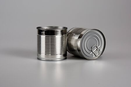Two cans on a grey background isolatedの写真素材
