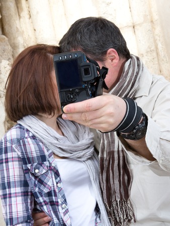 Happy and lovely tourists taking a selfieの写真素材