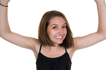 picture of young happy woman with her hands up isolatedの写真素材