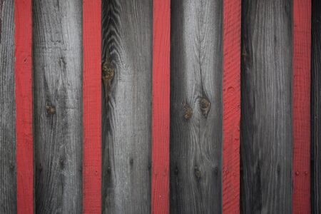 Red and dark grey stripe pattern vintage wooden background.の写真素材
