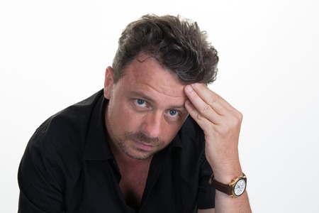 Closeup portrait of angry, upset, screaming man with bad attitude, messed up, looking neurotic, isolated on white background.の写真素材
