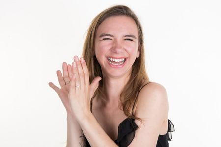 Laughing Teen girl beautiful cheerful enjoying isolatedの写真素材