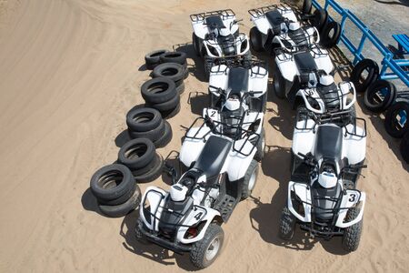 Flat lay of quads on the beach