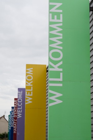 Word "Welcome" written on a billboard in severals languagesの写真素材