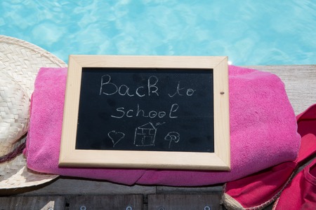 Back to school blackboard / chalkboard. on the poolの写真素材