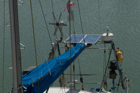Solar charging batteries aboard a sail boat Photovoltaic panels energy conceptの写真素材