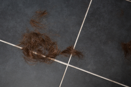 plenty hair cut off on the floorの写真素材