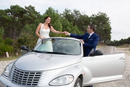 the grey car for wedding day, summer of love coupleの写真素材