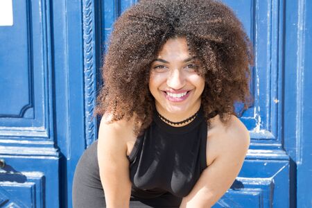 beautiful young woman smiling of African originの写真素材