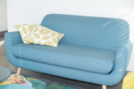 green blue sofa in a Scandinavian fashion interiorの写真素材