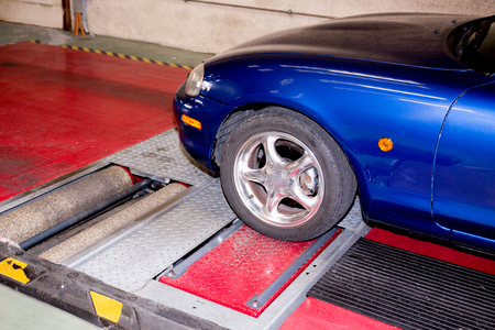 Shock absorber test rolls in a garageの写真素材