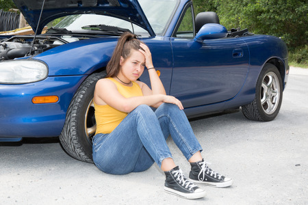 Woman being very angry because of her car failed engine