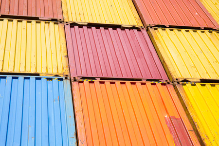 Container of all colors superimposed on each otheの写真素材