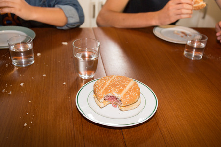 Delicious fresh homemade burger on a wooden tableの写真素材
