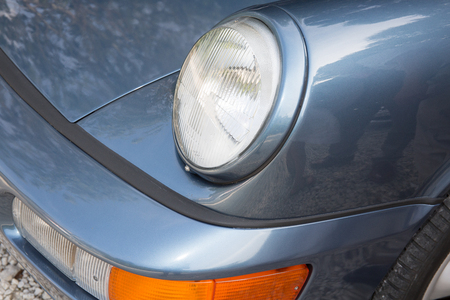 front headlight of an old sports collection carの写真素材