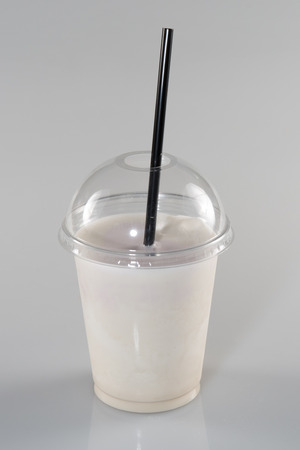 smoothie in plastic cup Milkshake isolated on a white backgroundの写真素材