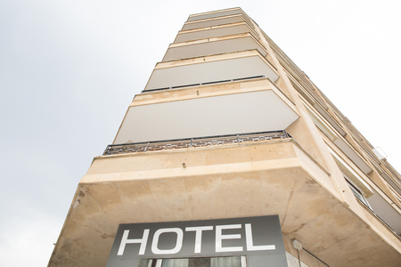 the front of a hotel by the seaの写真素材