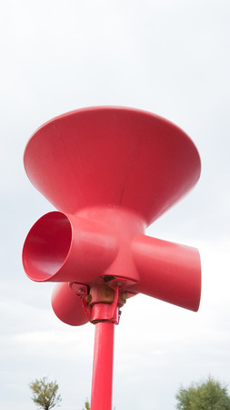 speakers sounding a warning or siren sounding alarm or warningの写真素材