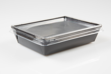 Empty black plastic container isolated on whiteの写真素材