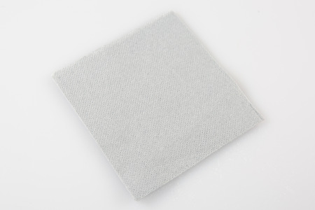 grey paper napkin isolated on white background