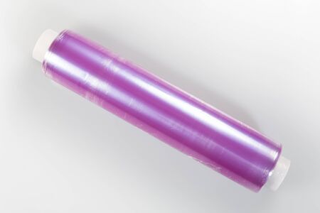 roll of transparent film to pack pallets on a white backgroundの写真素材