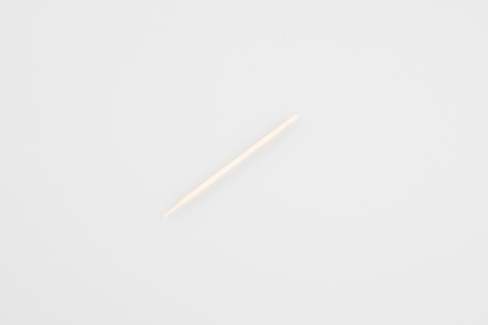 wooden toothpick on a white backgroundの写真素材