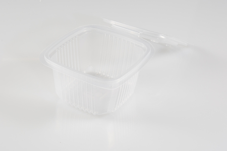 Transparent plastic food box isolated on white background