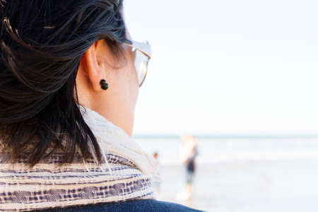 woman in holidays looking seacost vacationの写真素材