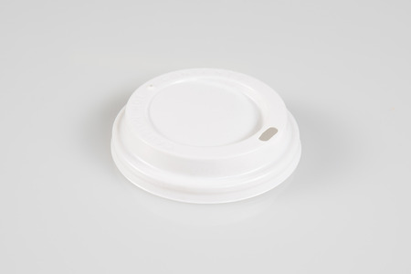 white plastic round lid for an ice cream or coffee in a fast food restaurantの写真素材