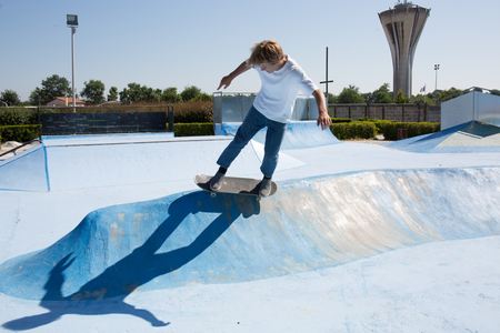 Skater doing kickflip on the rampの写真素材