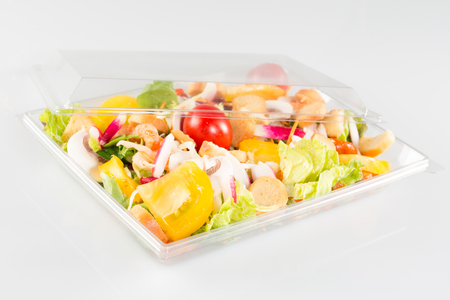 fresh vegetable salad in plastic takeaway bowlの写真素材